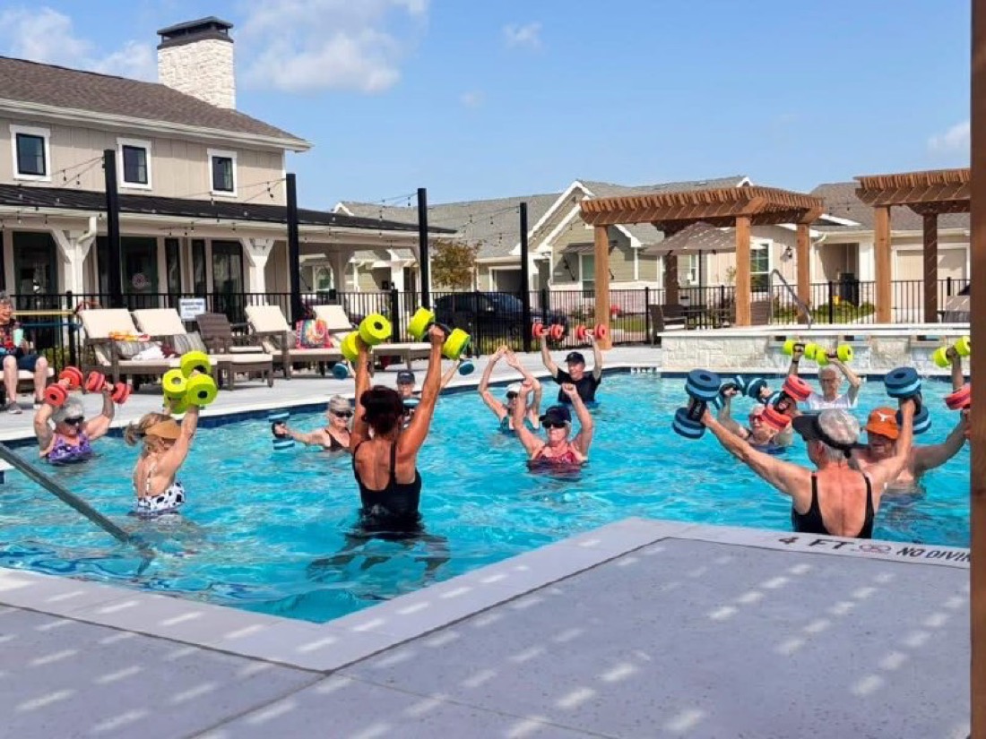Seniors in a water aerobics class